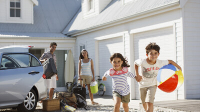 A family unpacking at their vacation home.