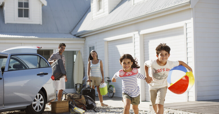 A family unpacking at their vacation home.