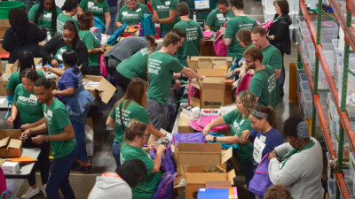 WSFS Associates packing school supplies into boxes.