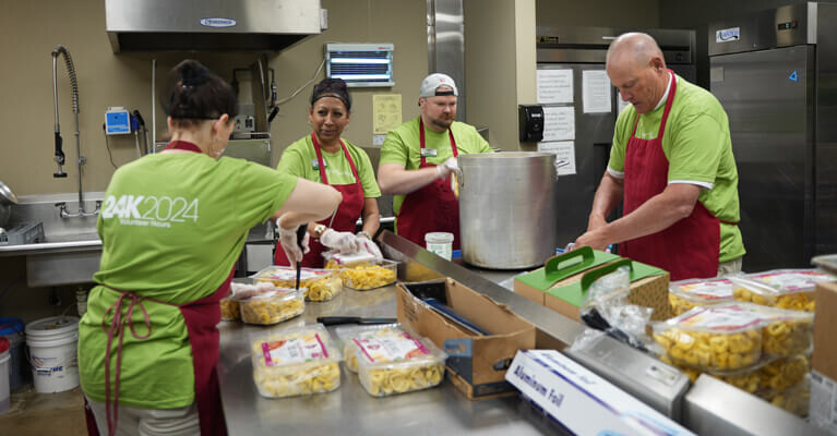 WSFS Associates volunteering in a kitchen.