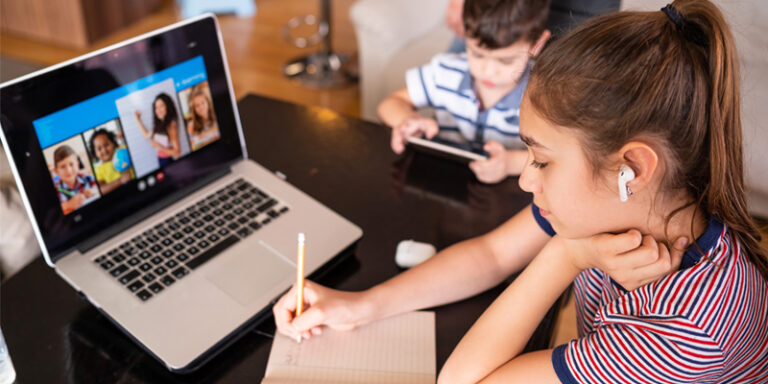 Teenage girl attending a digital class.