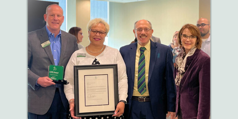 Sunday Breakfast Mission presenting WSFS with its inaugural Corporate Action Response and Engagement (CARE) Award.