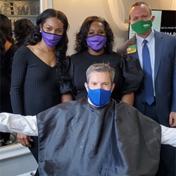 Fox 29 reporter with the Lavish salon crew.