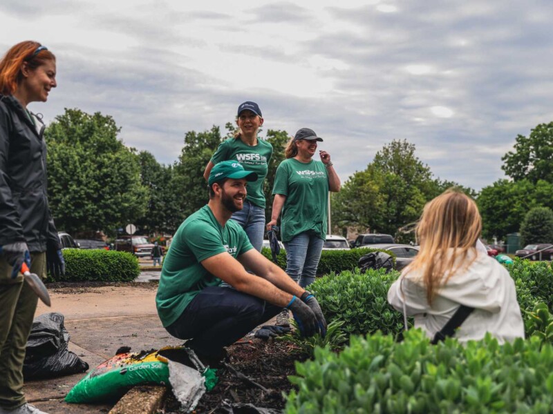 WSFS Associates volunteering in a garden.