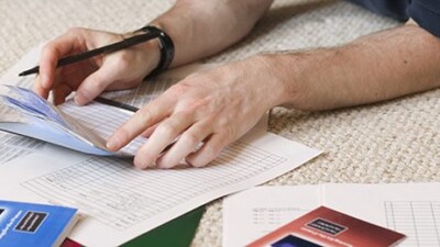 A man balancing his checkbook.