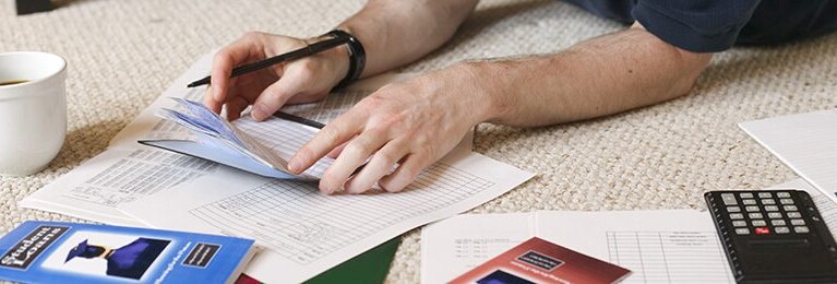 A man balancing his checkbook.