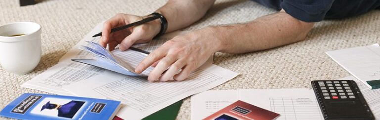 A man balancing his checkbook.