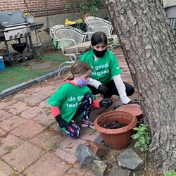 children planting flowers