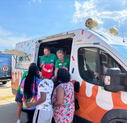 WSFS Associates handing out ice cream from the WSFS Ice Cream Truck at the Philadelphia Union Backpack Carnival.