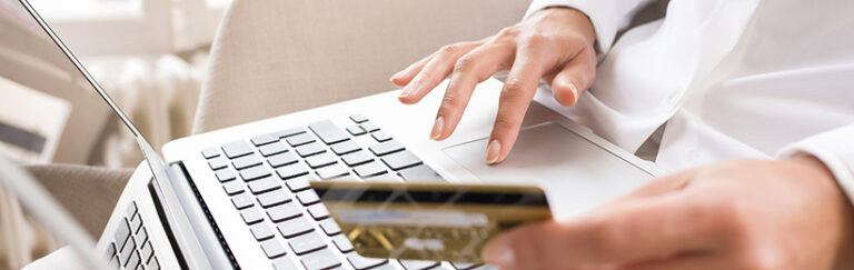 A person making an online purchase using a credit card.