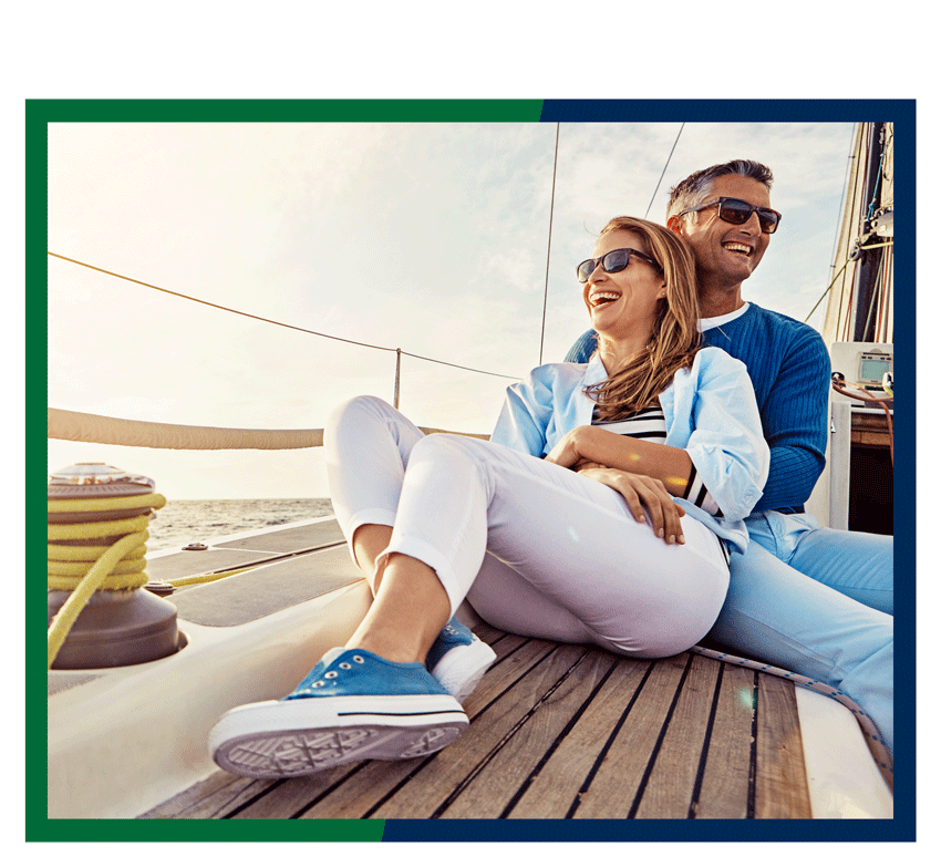Couple sitting together on boat deck