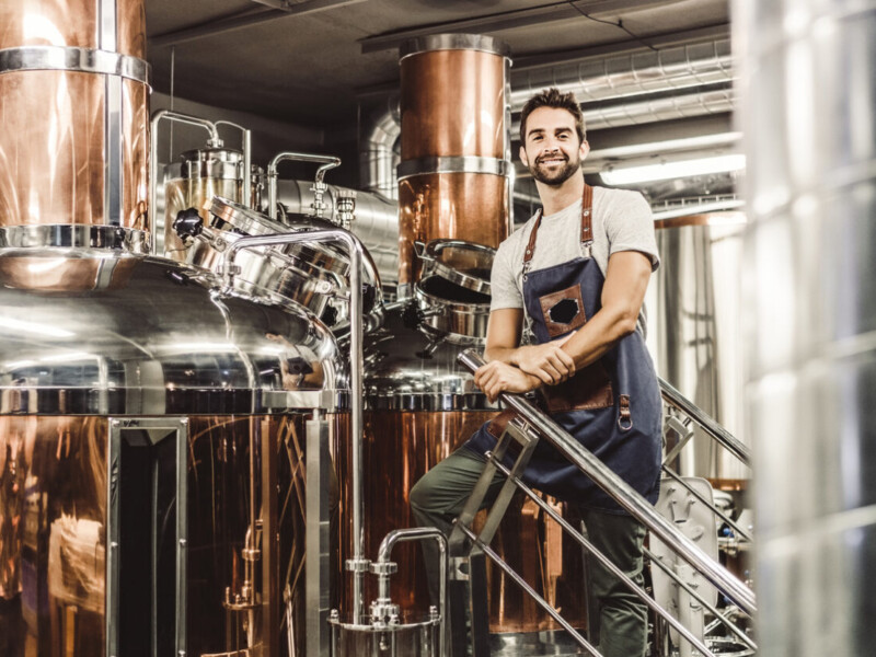 Brewer with brewing equipment.