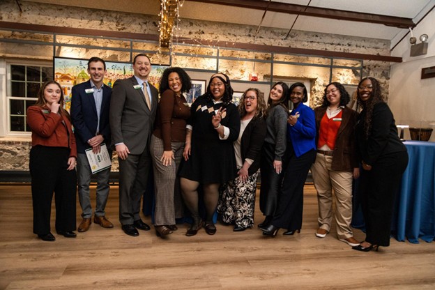 WSFS associates standing for a group photo