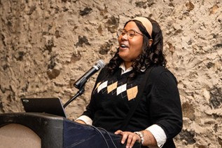 WSFS associate speaking into microphone