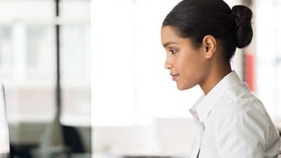 Woman using computer.