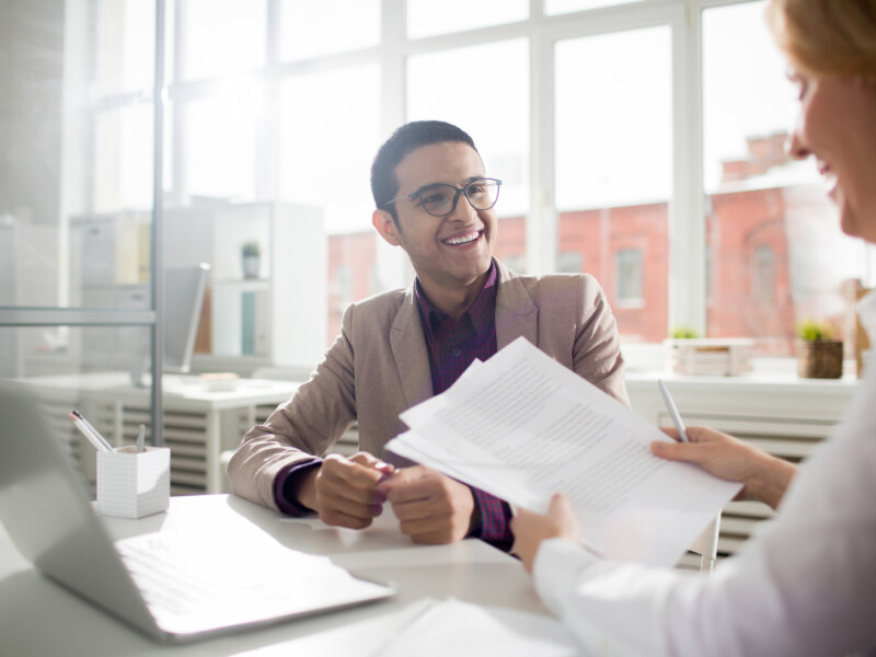 Businesspeople reviewing documents.