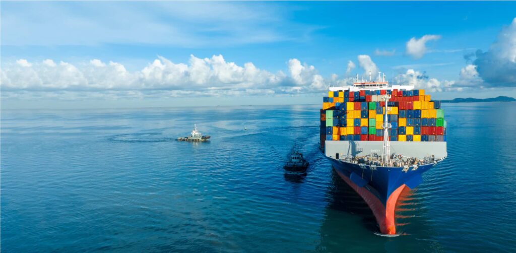 Capital Markets | Cargo ship at sea.