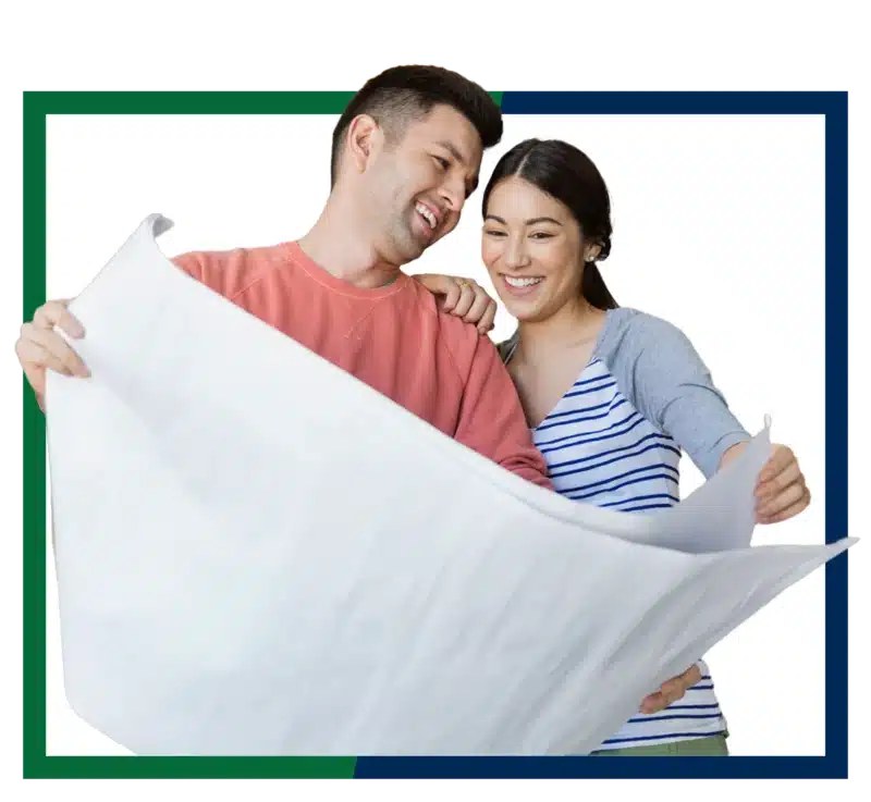 A couple looking at construction plans.