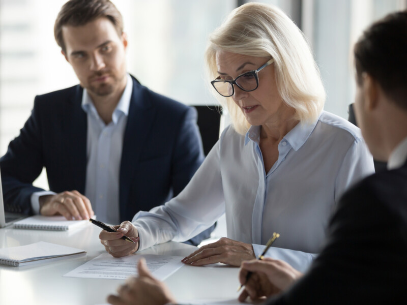 Business executives at a conference table.