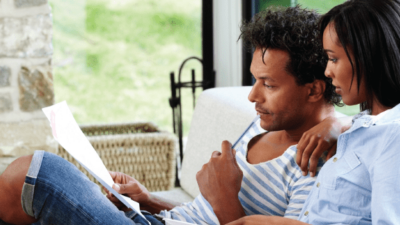 Man and woman reviewing documents.