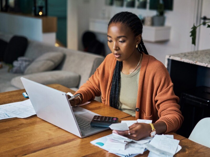 Woman using laptop.